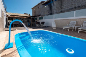 Casa confortavel com churrasqueira, rede e Wi-Fi